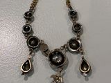 a close up of a necklace on a mannequin mannequin mannequin mannequin mannequin mannequin mannequin mannequin