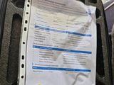 a piece of paper that is sitting in a piece of luggage