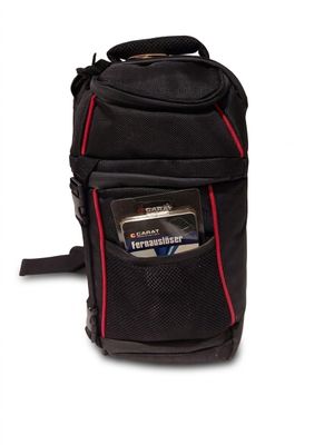 a black bag with a credit card and a wallet in it
