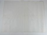 an old piece of paper with a piece of white paper on it