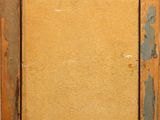 a painting of an old wooden frame with a yellow wall behind it