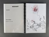 notebook with a drawing of a man on a toilet and a drawing of a woman on a toilet