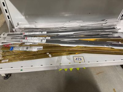 a lot of different types of scissors in a box