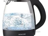 an image of a glass kettle with water in it on a white background