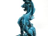 an image of a blue vase with a dragon on it