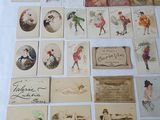 a lot of cards on the table with pictures on them
