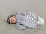a small child that is laying down on the floor