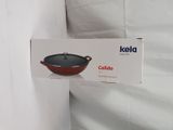 a box that has a red bowl on top of it
