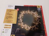 a picture of a christmas wreath on a table