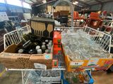 a cart full of bottles and bottles of wine in a warehouse