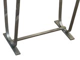 an image of a metal table with a glass top