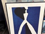 a picture of a framed picture of a man and a woman