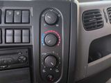 the dashboard of a car with various controls and controls on it