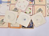 a lot of plates that are sitting on a table
