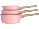 three pink bowls with wooden handles are stacked on top of each other