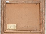 an old picture frame with a piece of paper in it