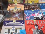 a lot of music books on the table