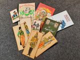 un grand nombre de livres posés sur le sol