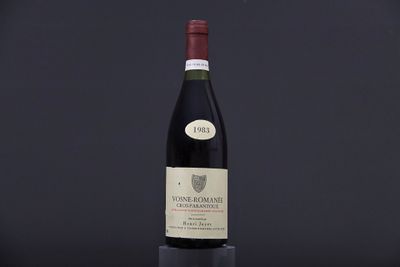 a bottle of wine sitting on top of a table
