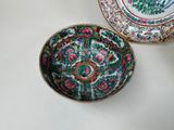 a bowl and a plate sitting on a table