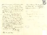 un vieux document écrit posé sur une table