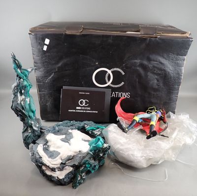 a box with a toy and some other items in it