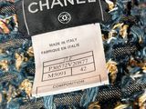 a close up of a chanel label on a jacket