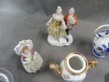 many figurines that are sitting on a table