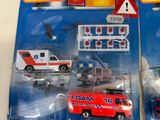 two matchbox vehicles that are on display on the table