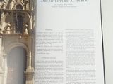 an open book with a picture of a building in it