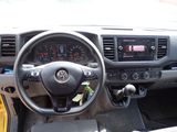 a dashboard of a car with a steering wheel and dashboard controls