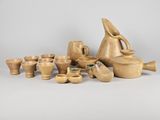 an image of a group of wooden objects sitting on top of a table