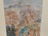 framed watercolor painting of a mountain scene with trees and a lake