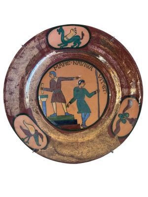 a plate with a picture of a man and a woman on it