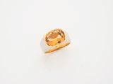 une image représentant une bague sertie d'une citrine