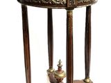 an image of a round table with a metal top and wooden legs