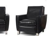 pair of black leather club chairs with chrome legs