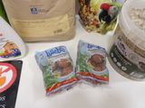 a bag of oats, a bag of granola, a bag of granola, a bag of granola, and a bag of granola
