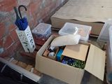 a cardboard box filled with assorted items on the floor
