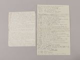 two pieces of paper with writing on them sitting on top of a table