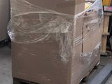 a large cardboard box on a pallet in a warehouse