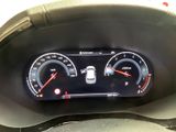 a close up of a car dashboard with a speedometer
