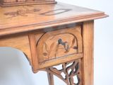 a wooden table with a clock on top of it