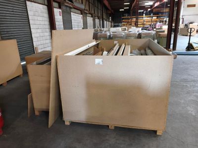 a lot of boxes that are sitting in a warehouse