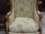 a chair that is sitting on the floor in the room