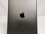 an apple ipad sitting on top of a table next to a white background