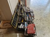 many tools that are sitting on the floor in the garage