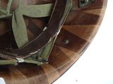 a close up of a helmet on a table