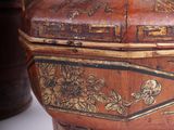 a small wooden box with a lid sitting on a table
