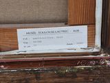 a sign on the window sill of a house that has been boarded